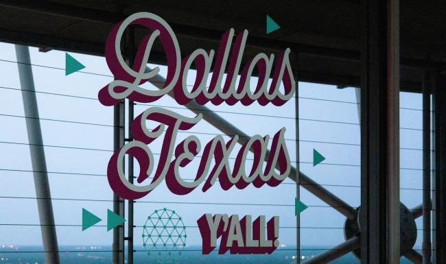 Find your perfect fit at The Lyla a sign with a building in the background