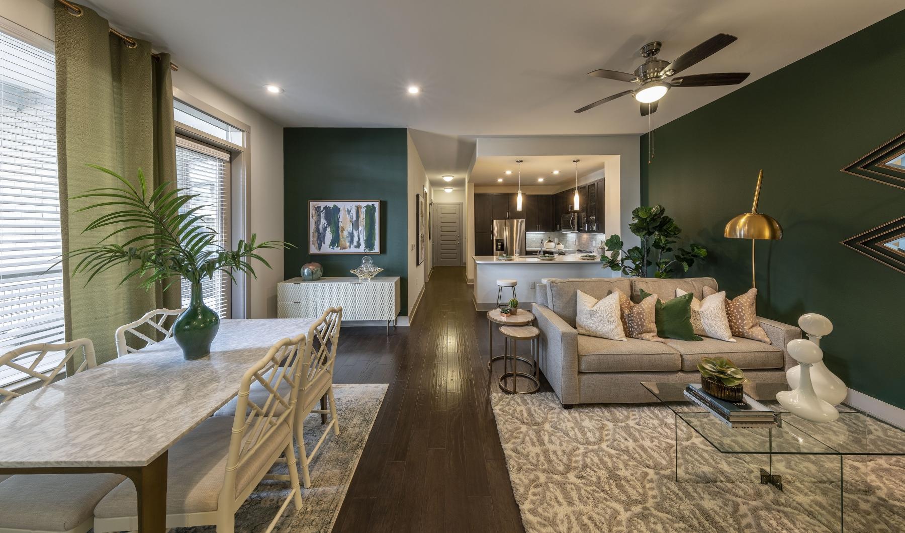 Bedroom options to fit every lifestyle a living room with a couch and a table