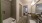 a bathroom with a tub and sink